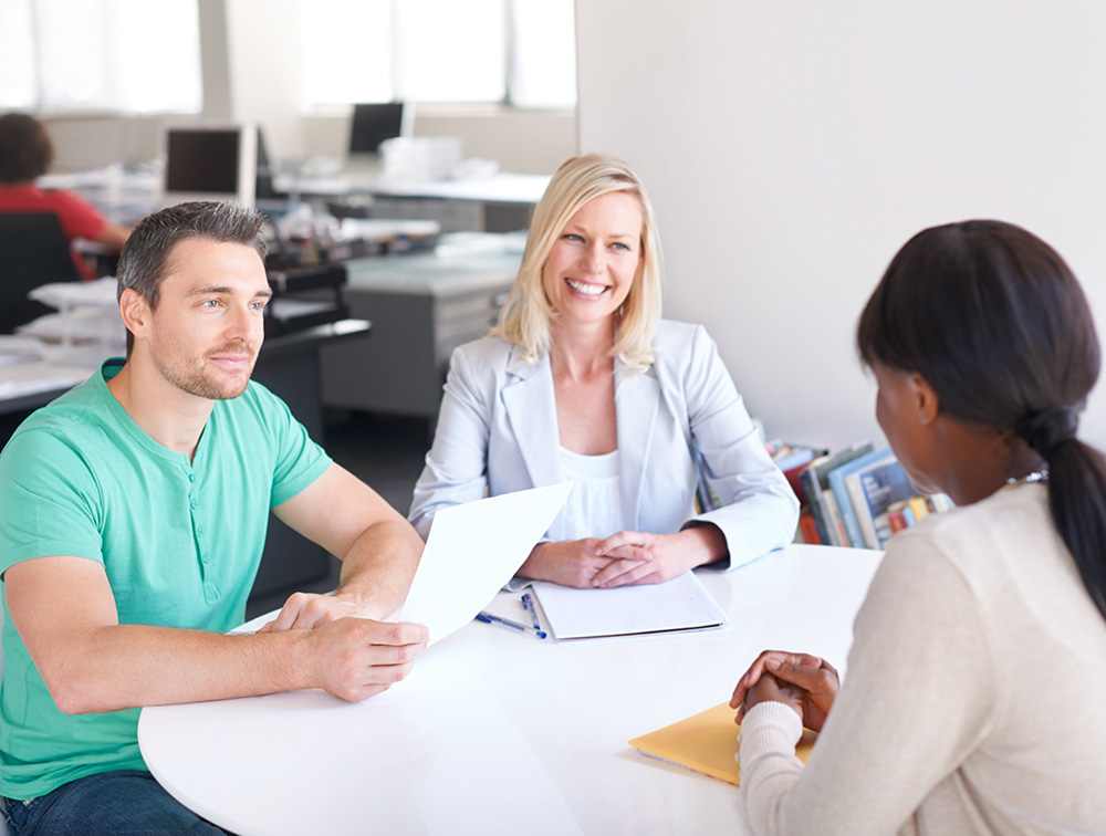 Woman asking questions during her interview