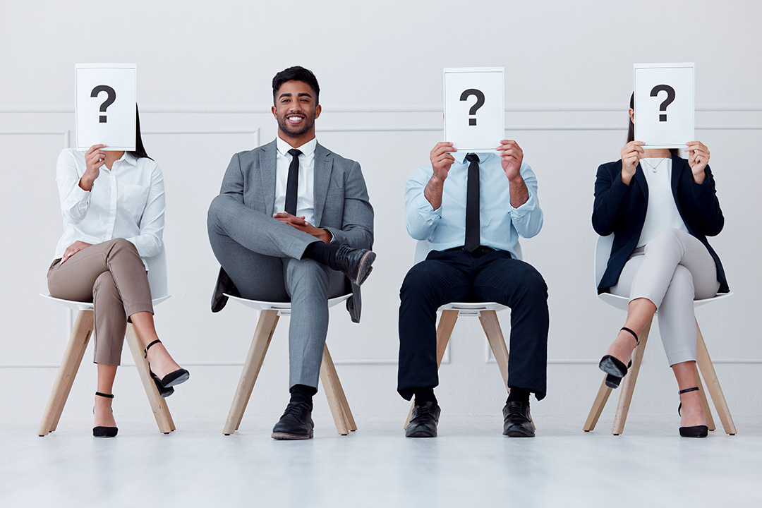 Man smiling waiting for an interview