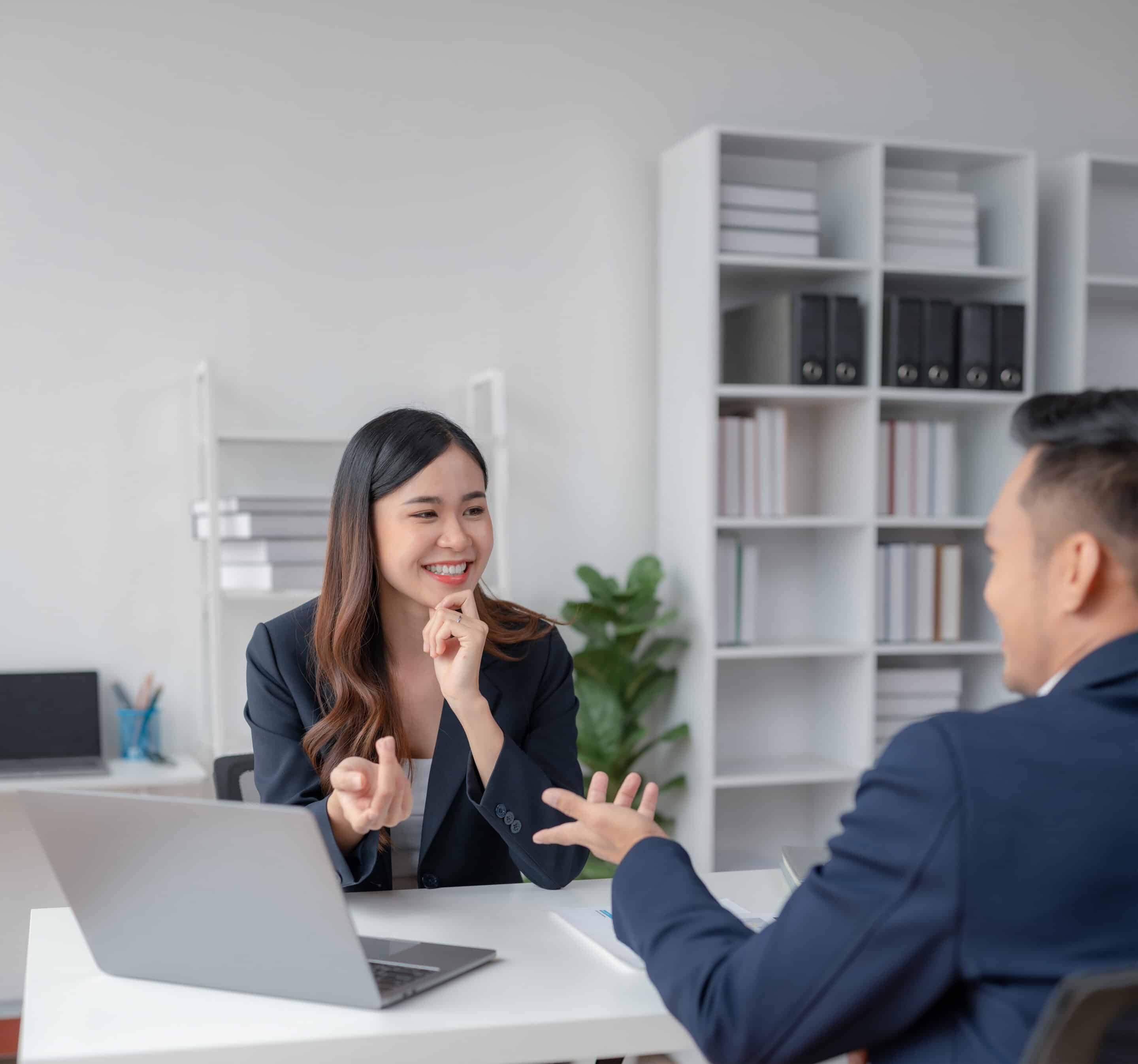 two business people doing an interview with hiregy